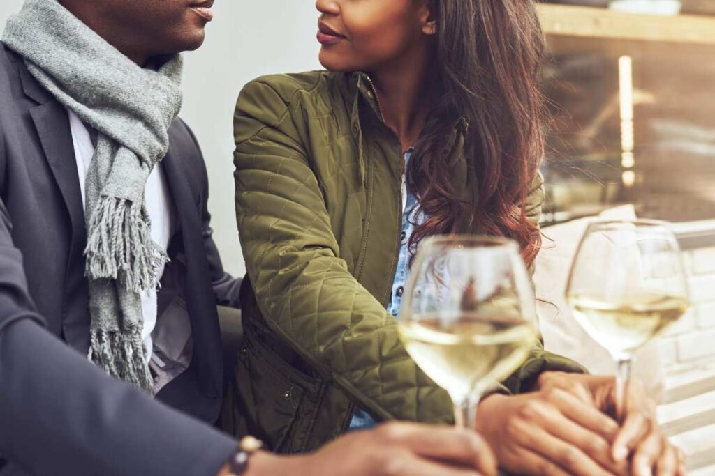 How to Tell if He’s Into You: The Subtle (and Not-So-Subtle) Signs 3 man and woman drinking glass