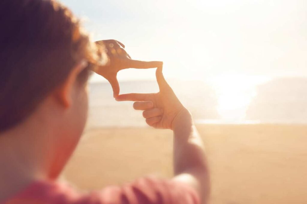 How to Tell if He’s Into You: The Subtle (and Not-So-Subtle) Signs 4 man on beach looking at the horizon